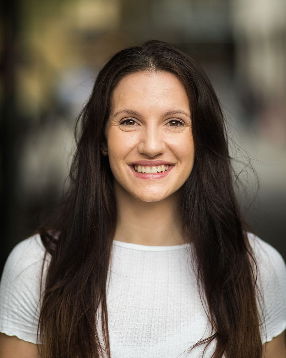 a woman smiling for the camera